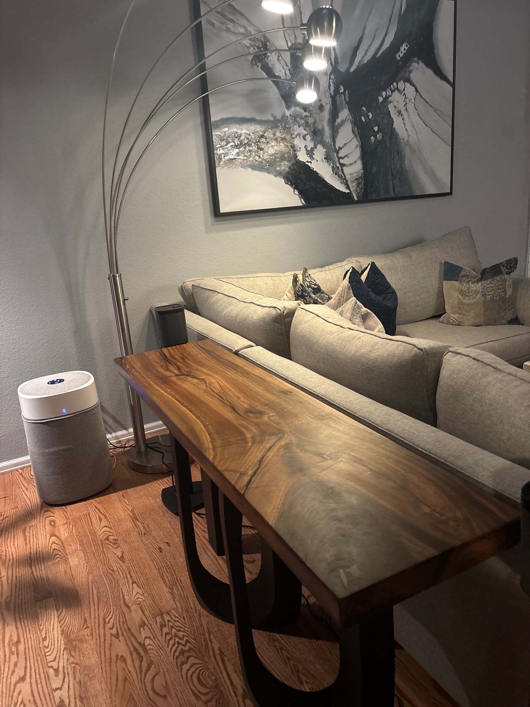 Angled view of the completed walnut console in its home